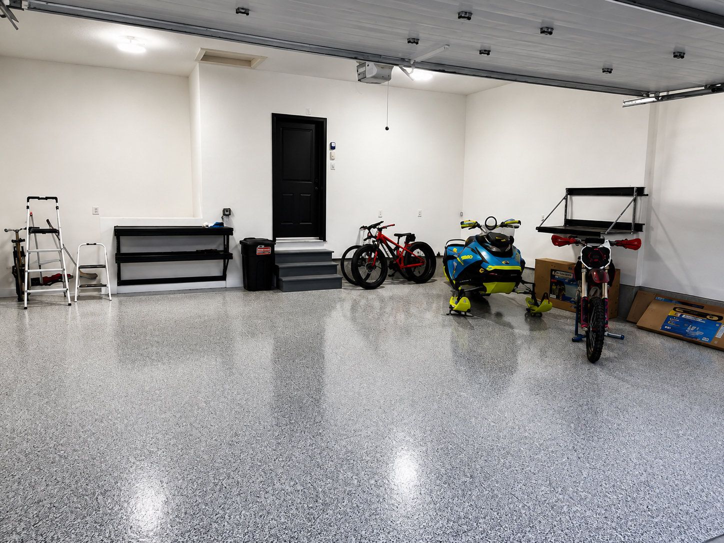 Seamless epoxy flooring system in a residential garage